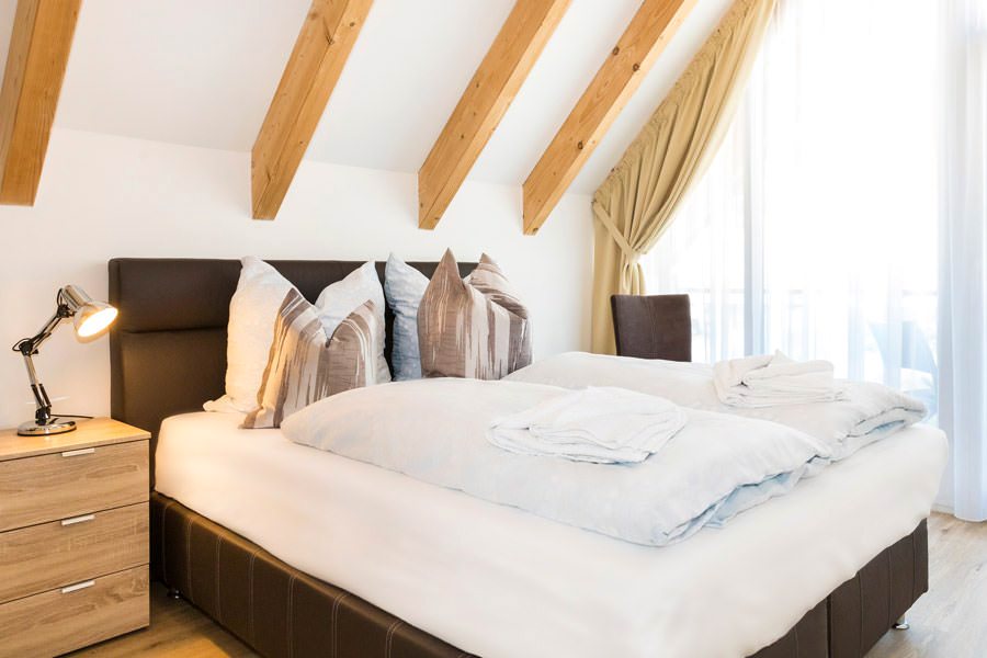 Bett im Schlafzimmer der Ferienwohnung Möwenglück im Ostseebad Sellin auf Rügen