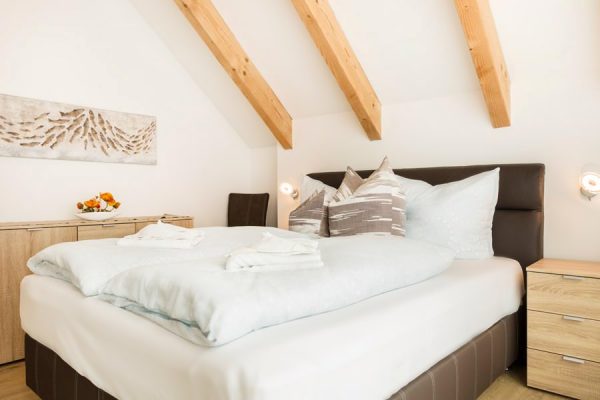 Schlafzimmer der Fewo Möwenglück im Ferienhaus Meeresleuchten im Ostseebad Sellin auf Rügen
